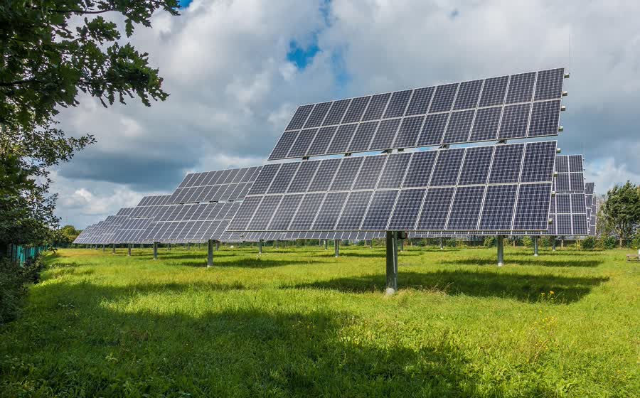 Portable solar charging setup showing panel conditions and output context